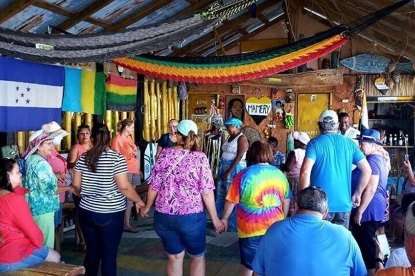 Learning about the "Garifuna" living culture in the east of Roatan