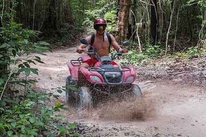 ATV Mud Kicking och Snorkling med båt i Cozumel