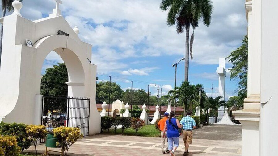 Walking in front of the basilica church in El Viejo town.