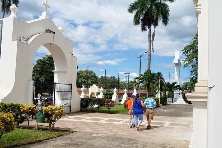 Walking in front of the basilica church in El Viejo town.