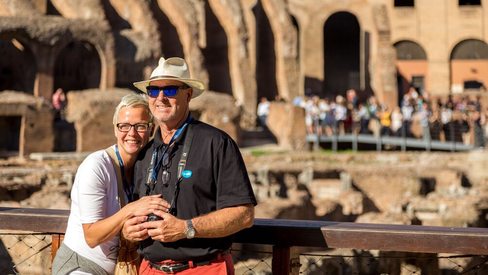 Couple touring the Colosseum in Rome