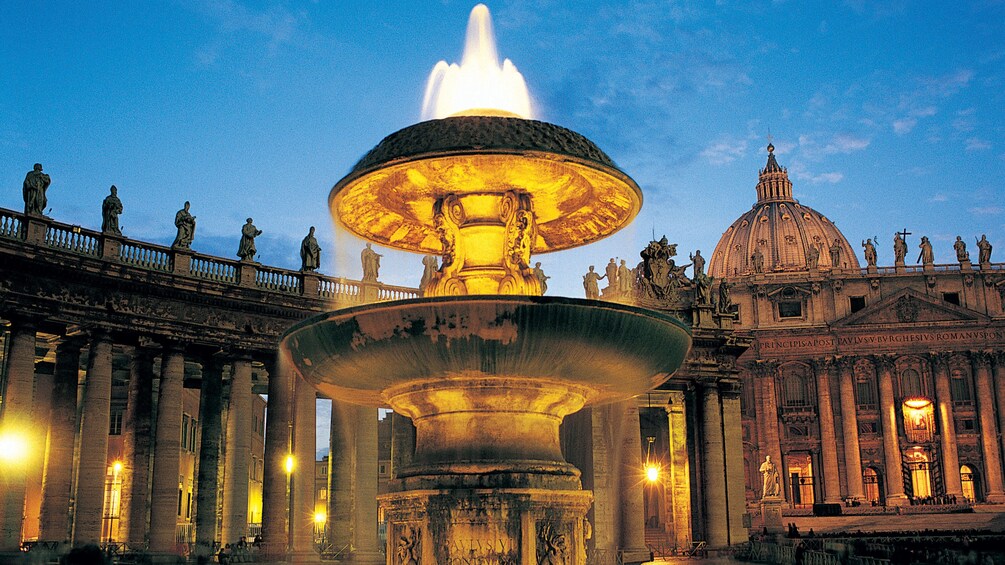 Evening image of the fountain in the Vatican City in Rome Italy 