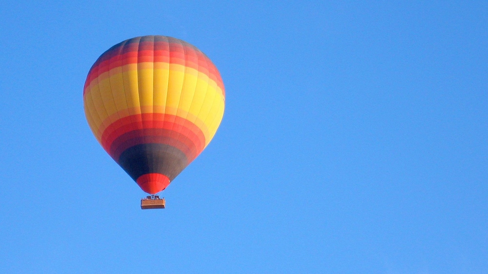 Show item 4 of 6. hot air balloon floating high overhead in Dubai
