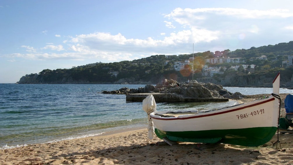 small boat on beach in Barcelona