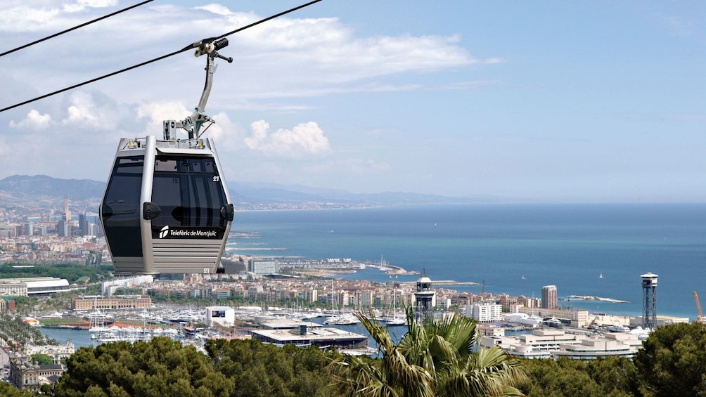 cable cars riding far above ground in Barcelona