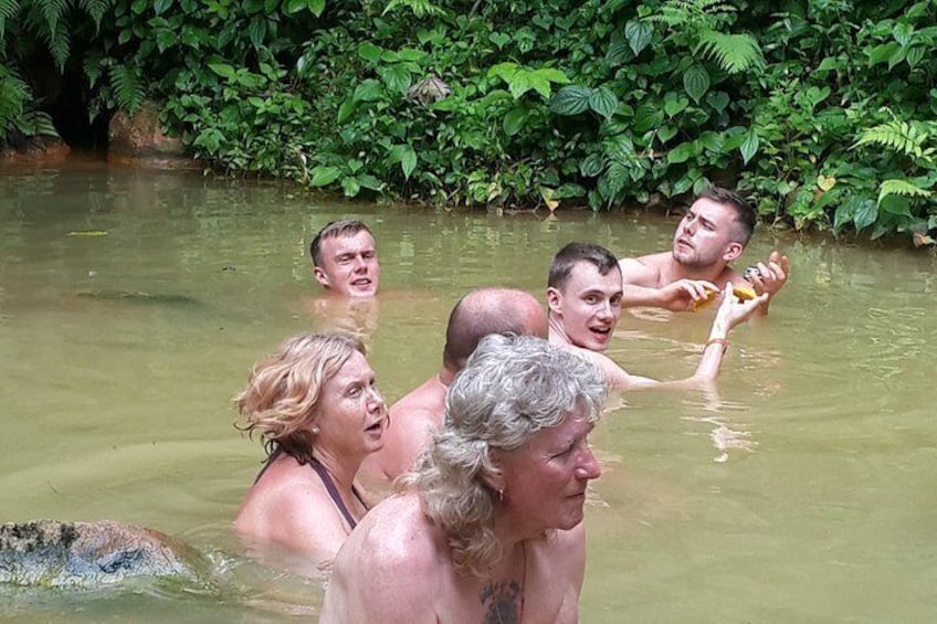 A theraputic soak in the Clabone Sulphur Pond whils enjoying some local mangoes