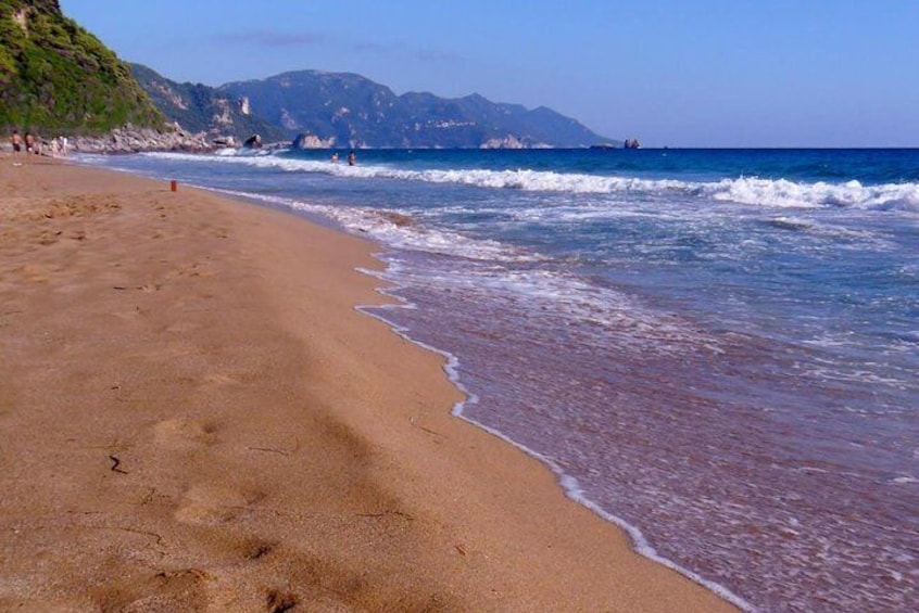 Glyfada Beach sand and waves