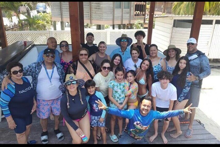 West end beach ,happy group enjoying the sunny day in roatan.