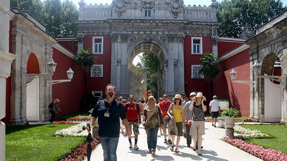 View of a group touring DolmabahÃ§e Palace in Turkey 