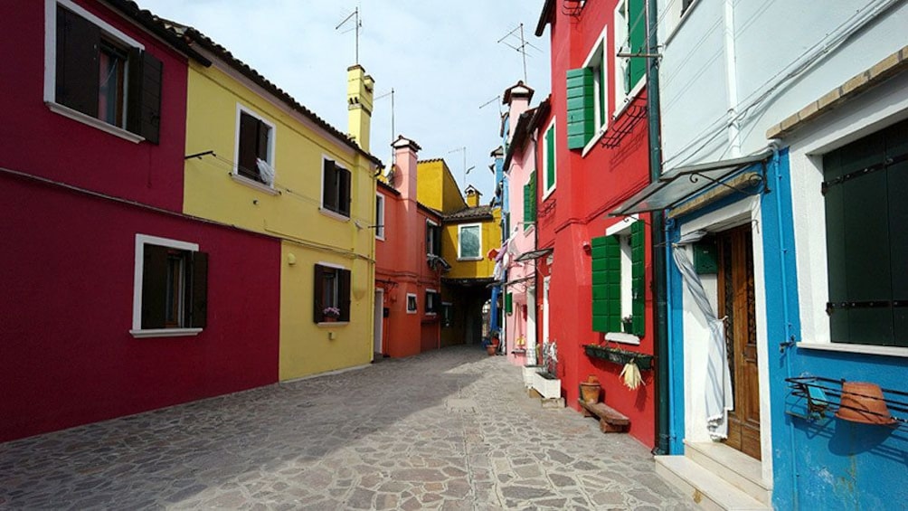 Colorful houses on the street of Venice Italy