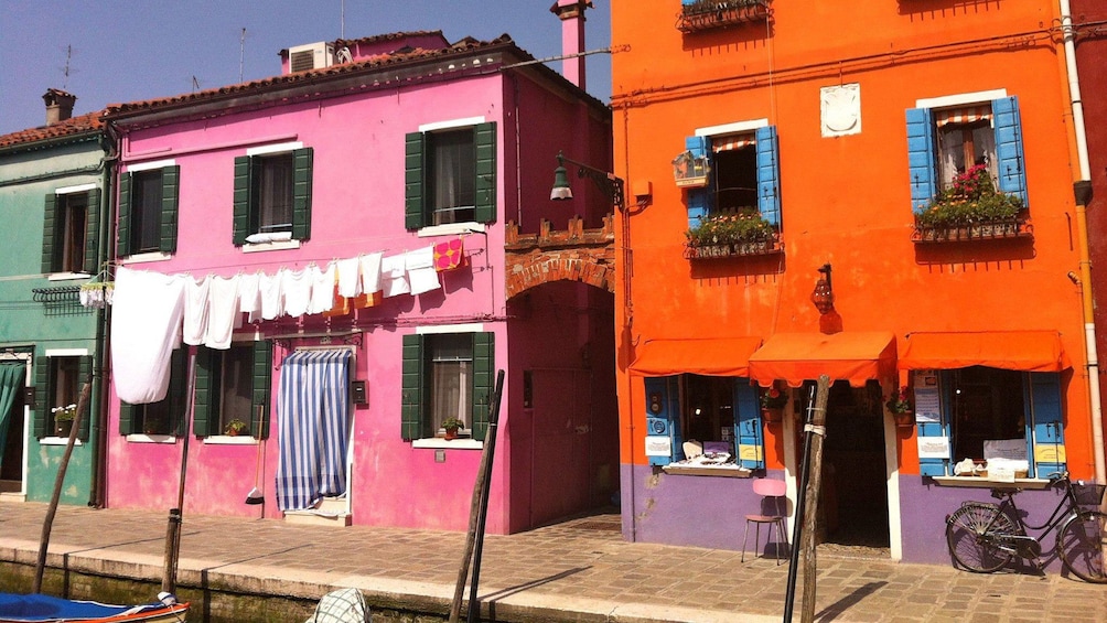 Colorful buildings along canal in Venice Italy