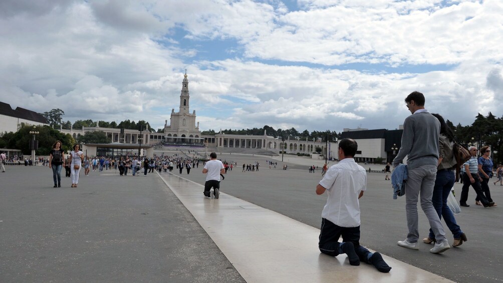 Religious faithful attending mass at the Fatima Sanctuary in Portugal