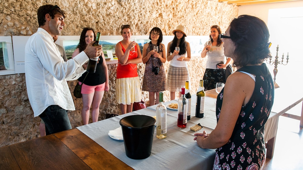 Sommelier show casing local wines from Portugal to tourists