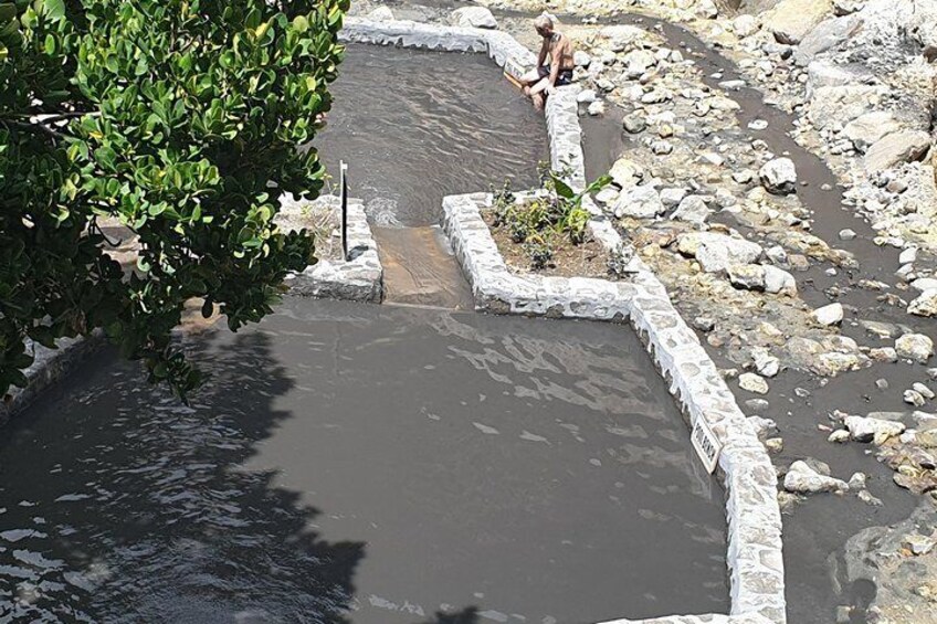 Black water pool at the sulphur springs where you can go for a mud bath