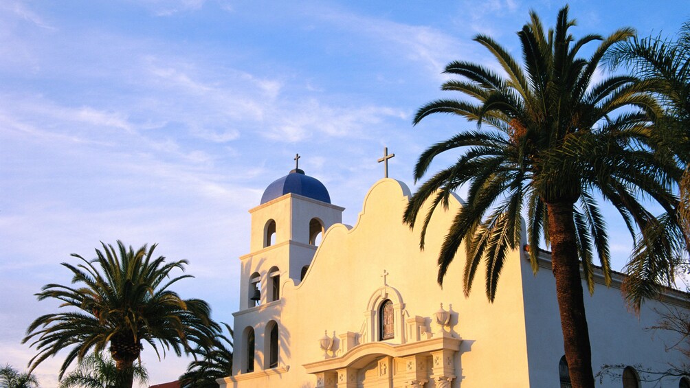 Church with palm trees on the San Diego City sightseeing tour in California