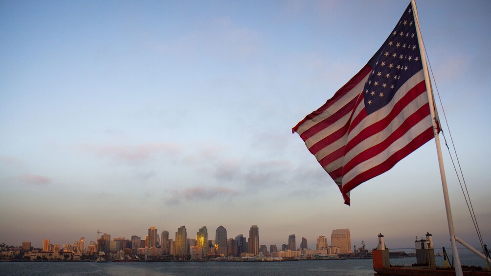 American flag on with San Diego in the background in California 
