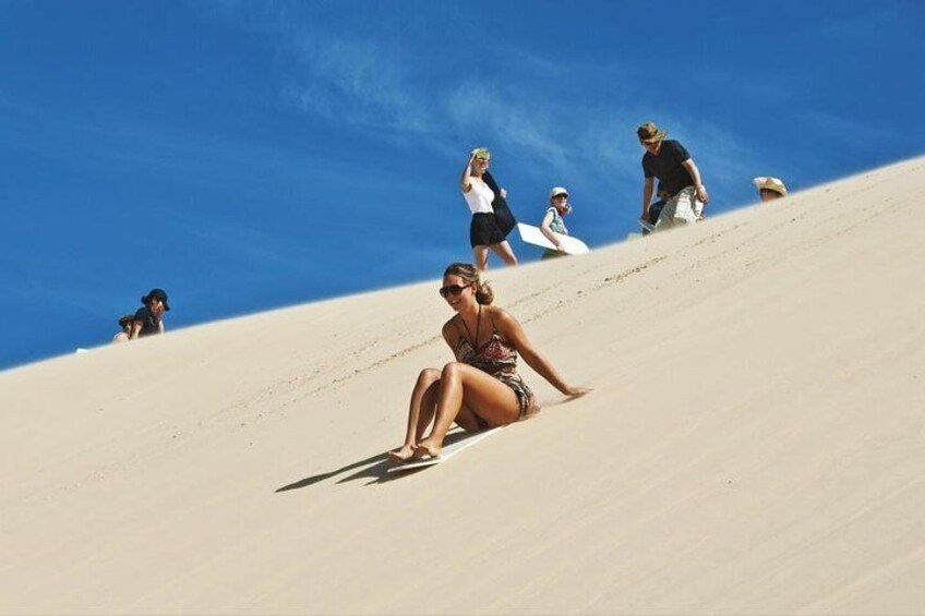 Desert Safari, Sand Boarding, Camel Ride, inland Sea Quick swim