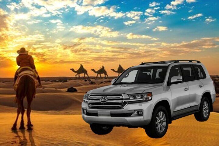 Private sunrise desert safari bashing\camel ride\sand boarding\Inland sea visit.