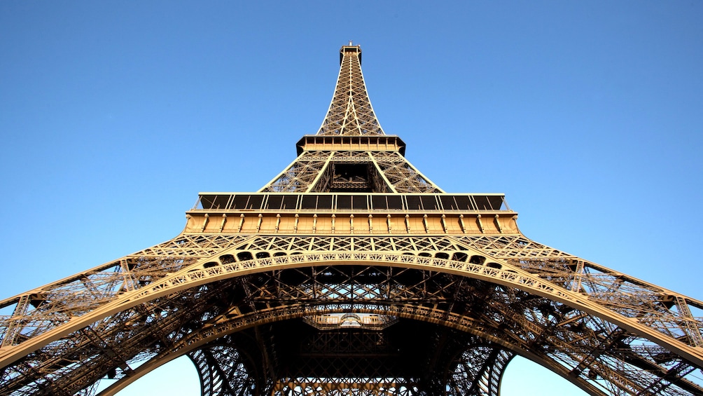 looking upwards at the Eiffel Tower in Paris