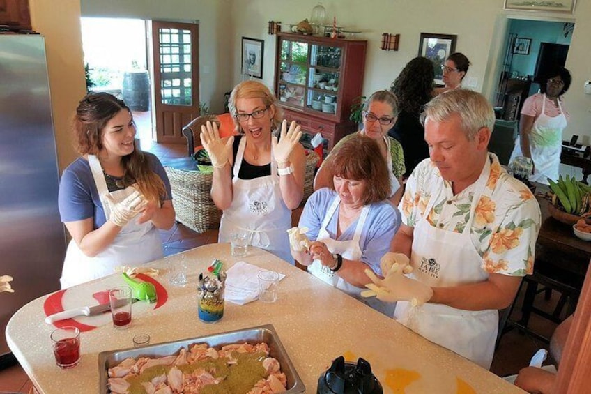 Look Mom! No hands! We marinade the jerk chicken with you so you learn how to do everything from scratch!