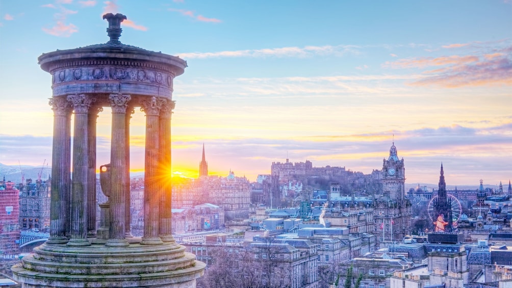 sunset behind pillars in Edinburgh
