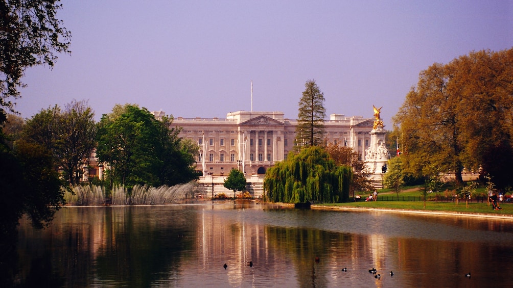 view of lake in front of Buckingham Palace in London