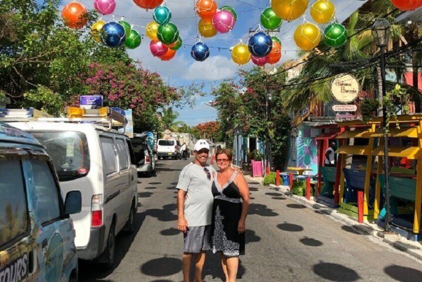 This couple enjoying our colorful streets!