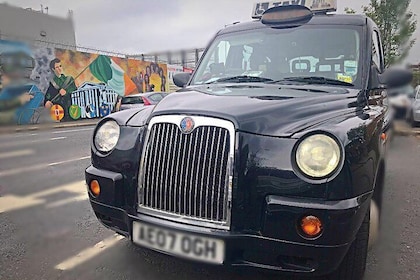 Offisiell Black cab taxi tur i Belfast berømte veggmalerier og politisk his...