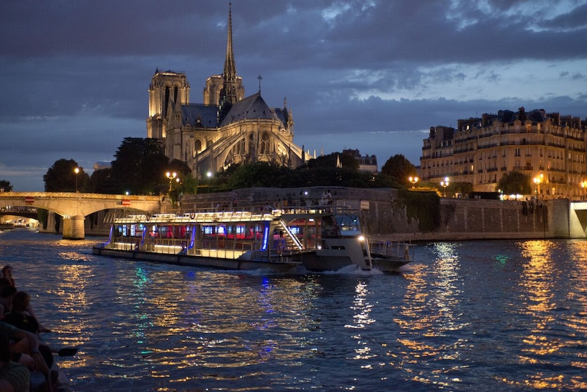 Paris by Night: City Tour & Show at the Moulin Rouge + Cruise Option