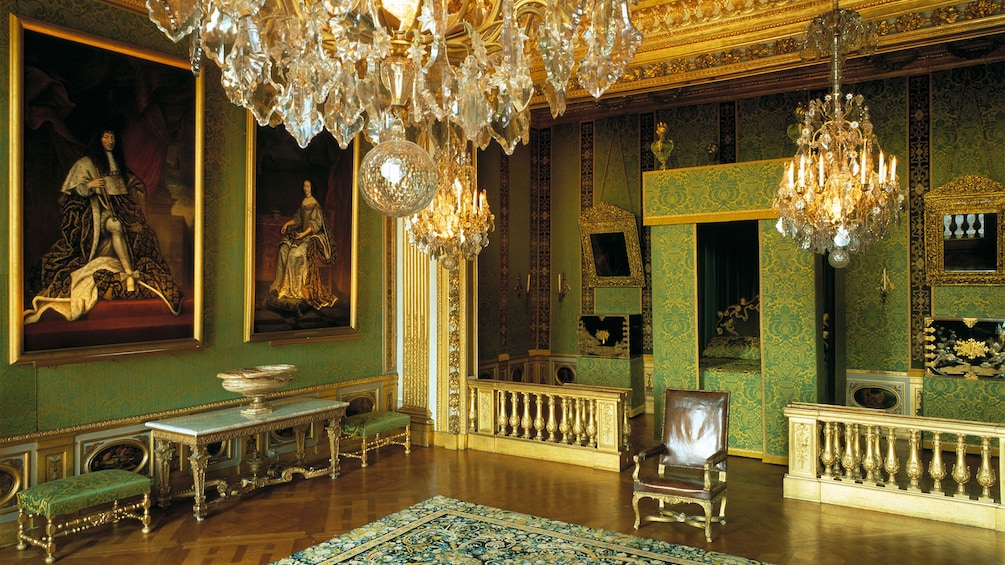 Opulent green bedroom inside Vaux Le Vicomte.