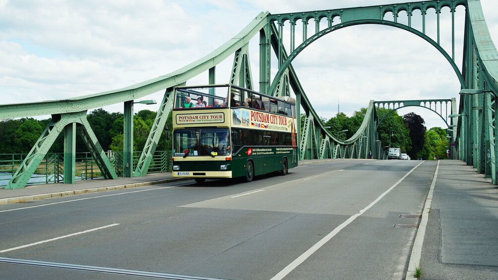 Tour bus crossing a bridge in Potsdam