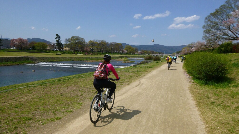 Show item 5 of 5. bicyclists in Tokyo
