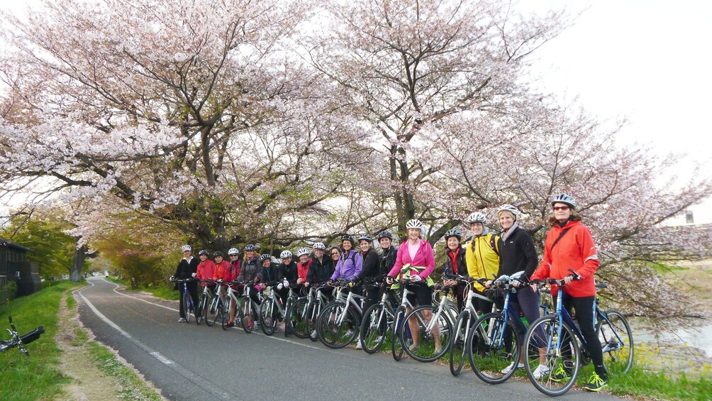 Show item 3 of 5. bicyclists in Tokyo