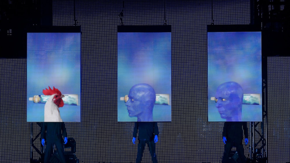 blue man group performing on stage in chicago 