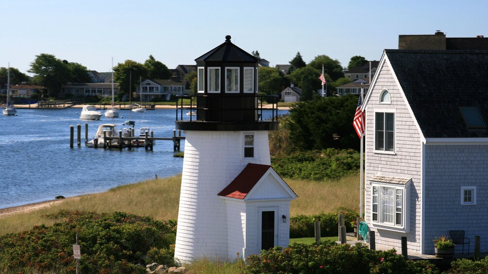 Lighthouse and seaside homes in Cape Cod