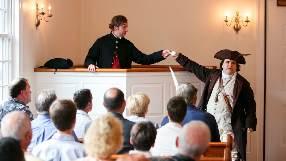 Actors reenacting a scene from the Boston Tea Party at the Boston Tea Party Ships Museum