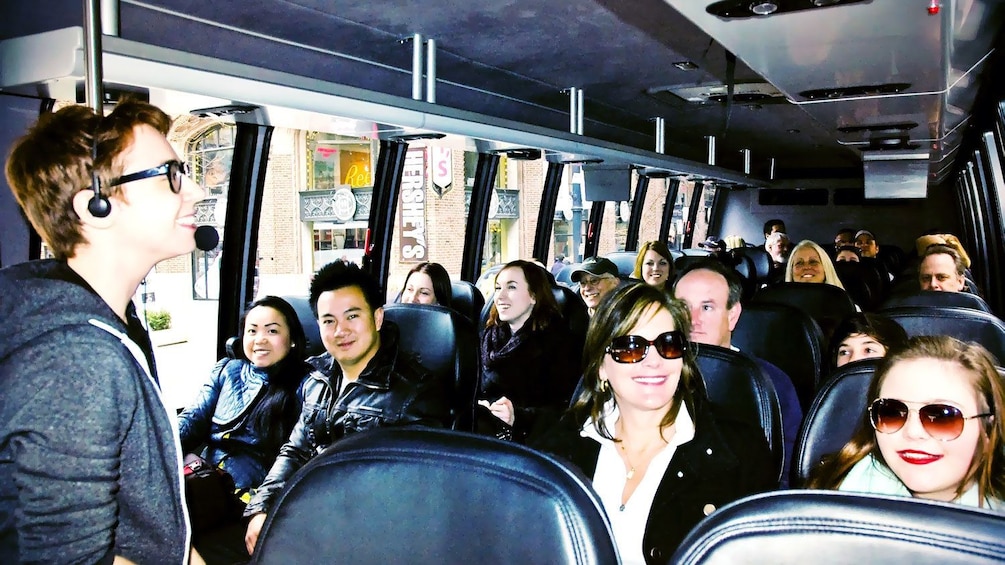 Show item 5 of 8. bus full of people on the crime tour in chicago
