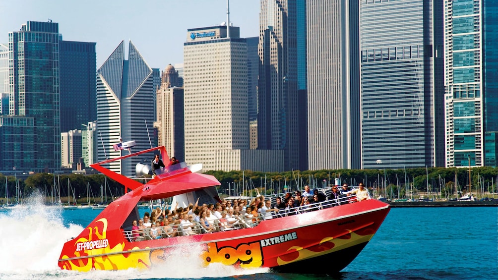 red speed boat in the lake in chicago 
