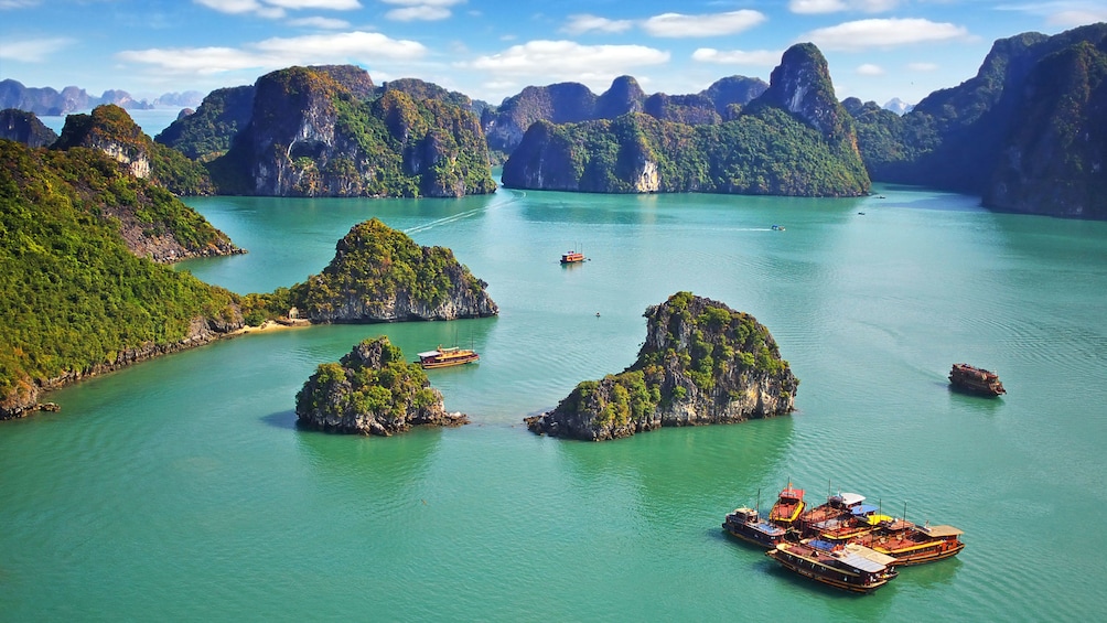 boats near small island clusters in Vietnam