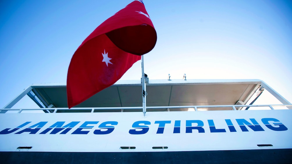 The Australian flag on the stern of a cruise ship on the swan river
