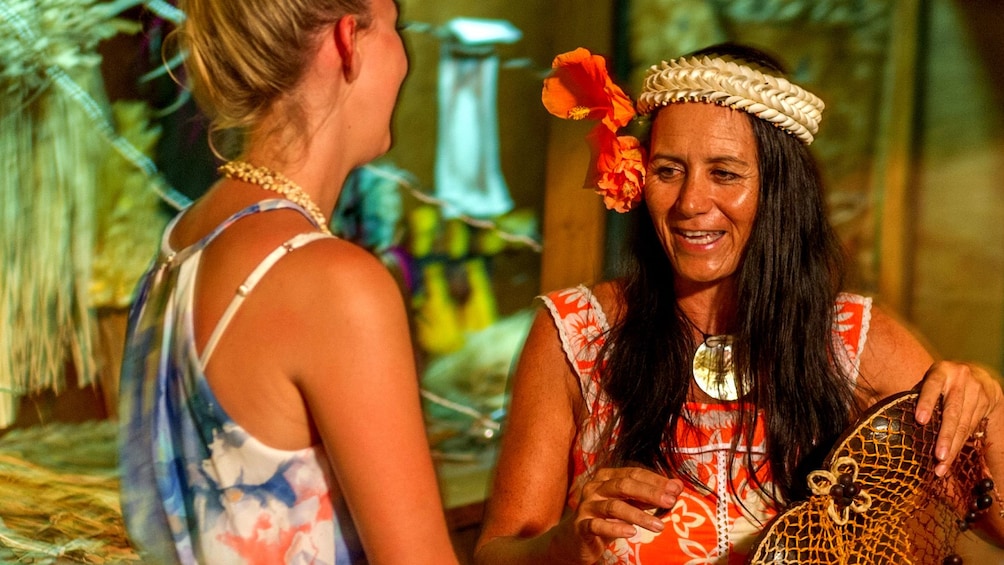 Show item 4 of 5. women on tour in cook islands