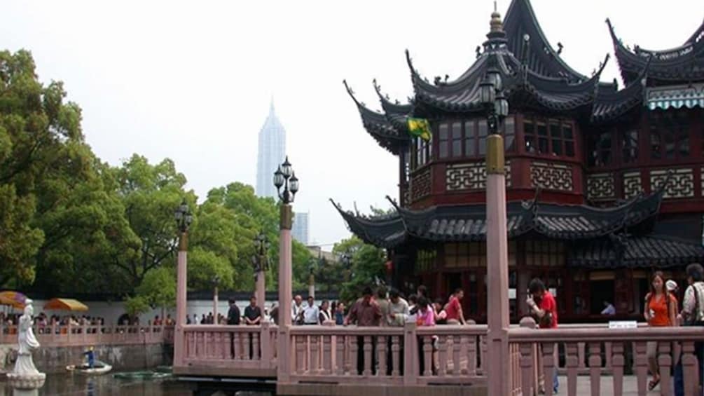 People standing in front of the Yu Garden an extensive Chinese Garden in Shanghai 