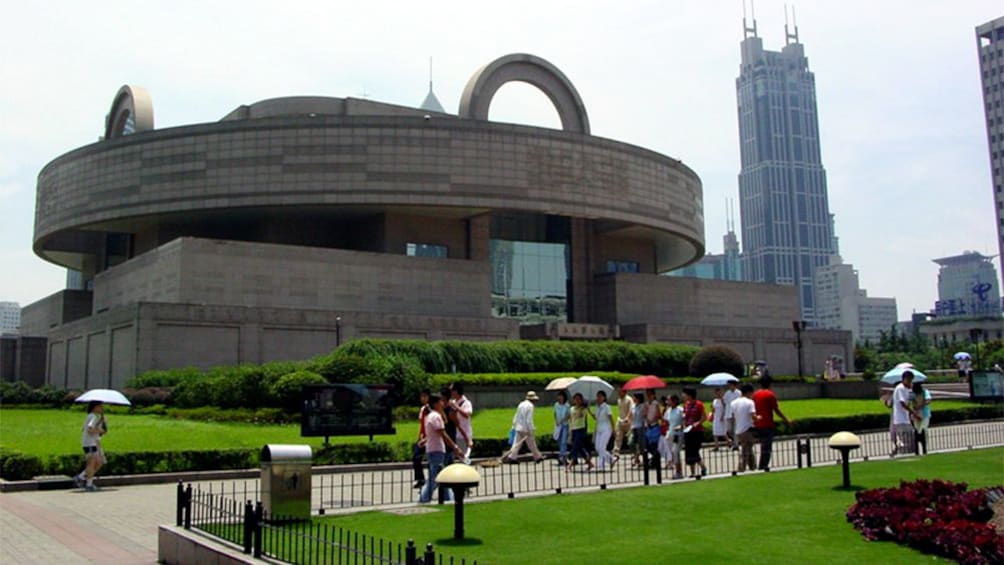 People walking in front of the Shanghai Museum in Shanghai