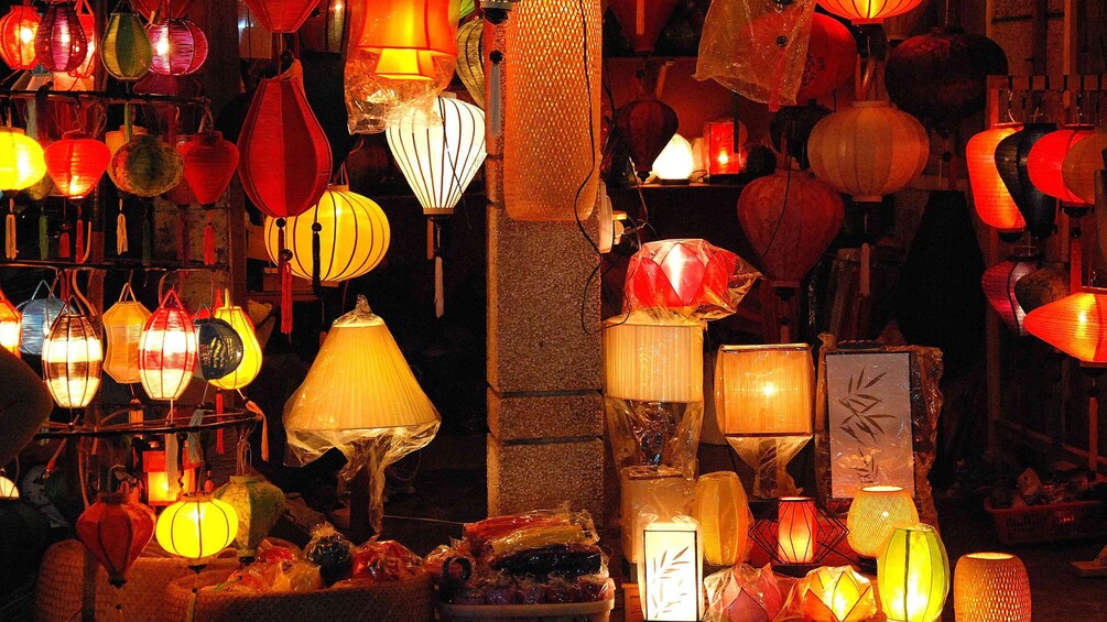 Stunning lanterns lit in a dark room in Vietnam