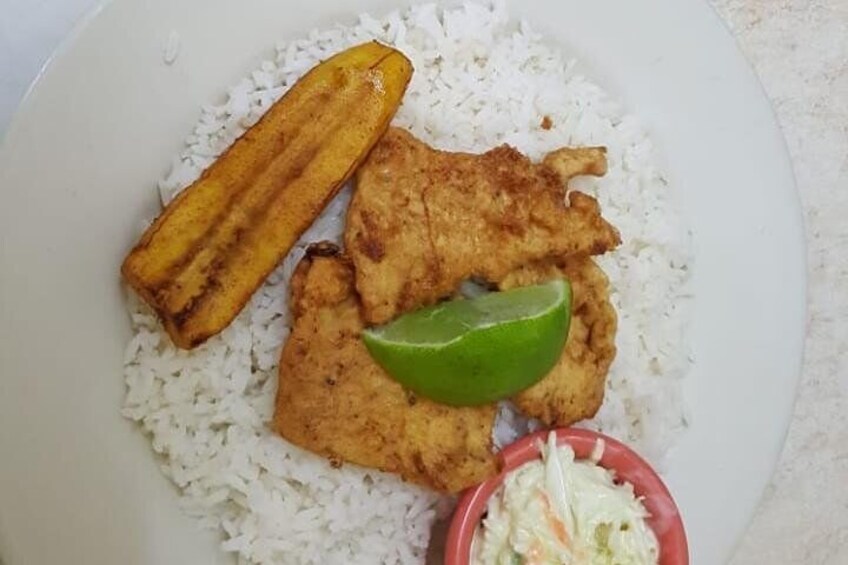 Fried red snapper with coconut rice and plantains 