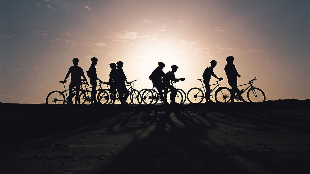 Silhouette of bicyclists in St Lucia