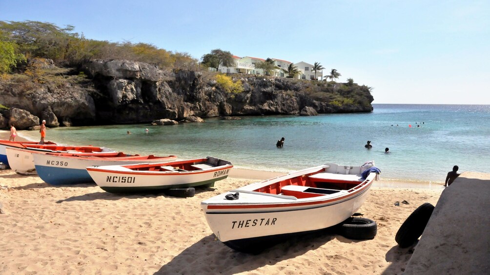 Show item 1 of 5. View of the boats along the shores of the Playa Lagun in Cuaracao