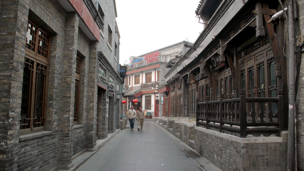 Men walking down the street in Beijing