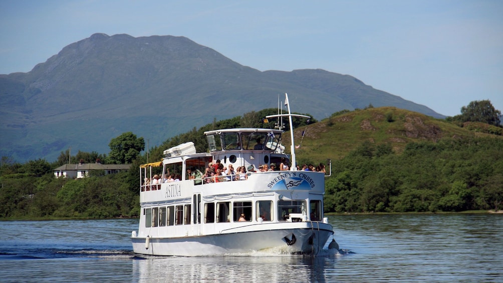 Show item 3 of 8. boat on the lake in scotland