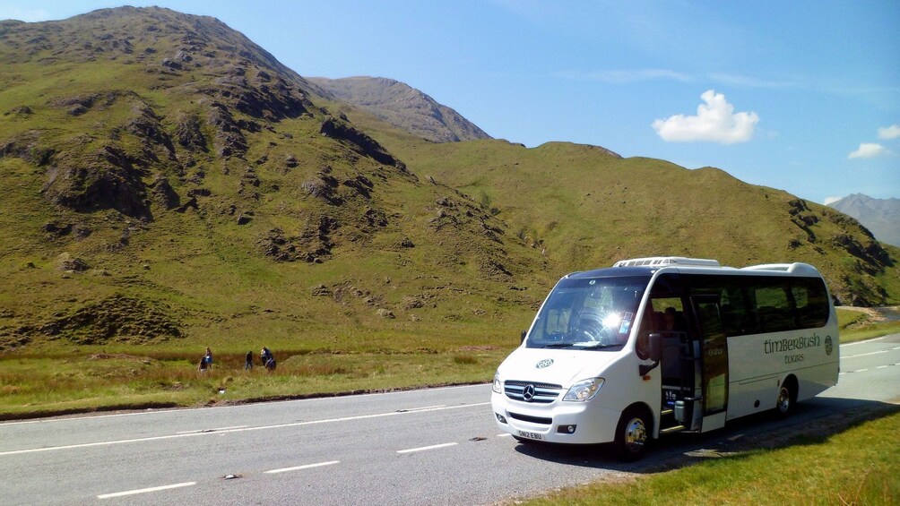 Show item 5 of 4. tour bus in scotland